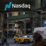 Markets End Mixed: Dow Hits Record High as Nasdaq Slips on AI Concerns